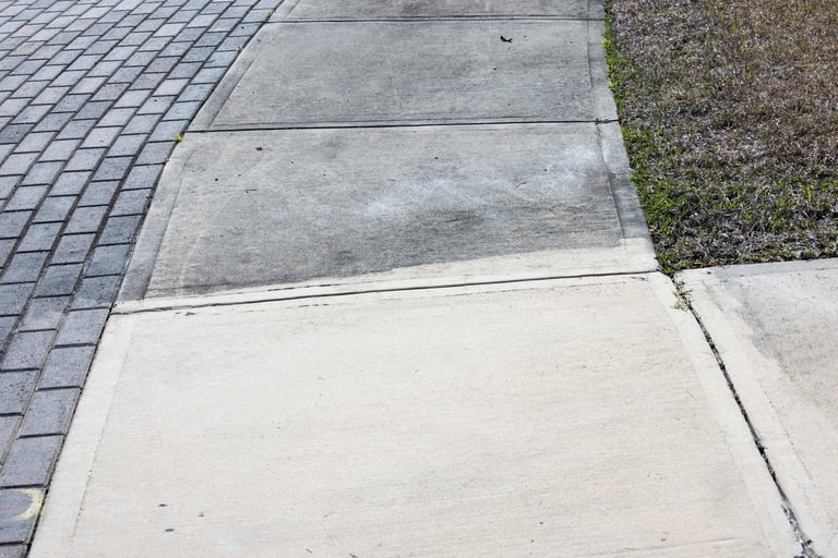 Before: Dirty concrete driveway